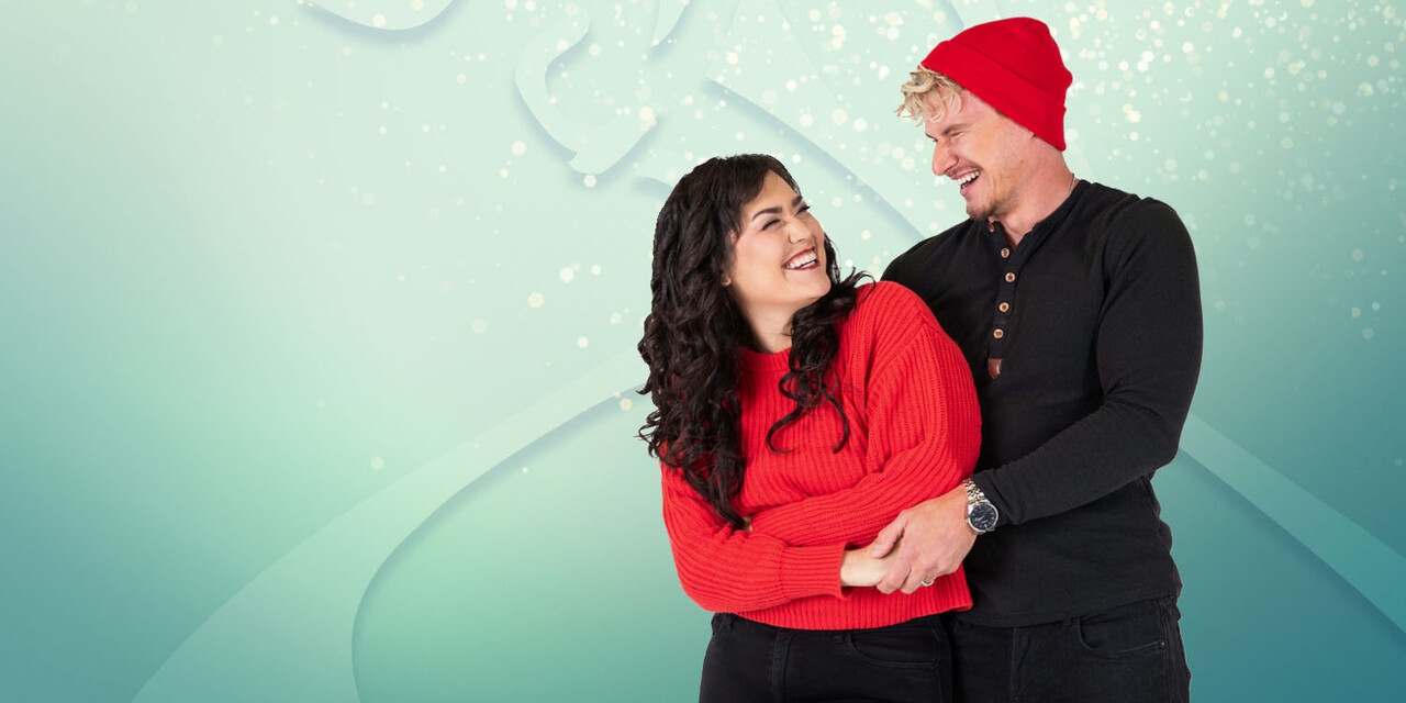 Young couple dancing together in the Winter